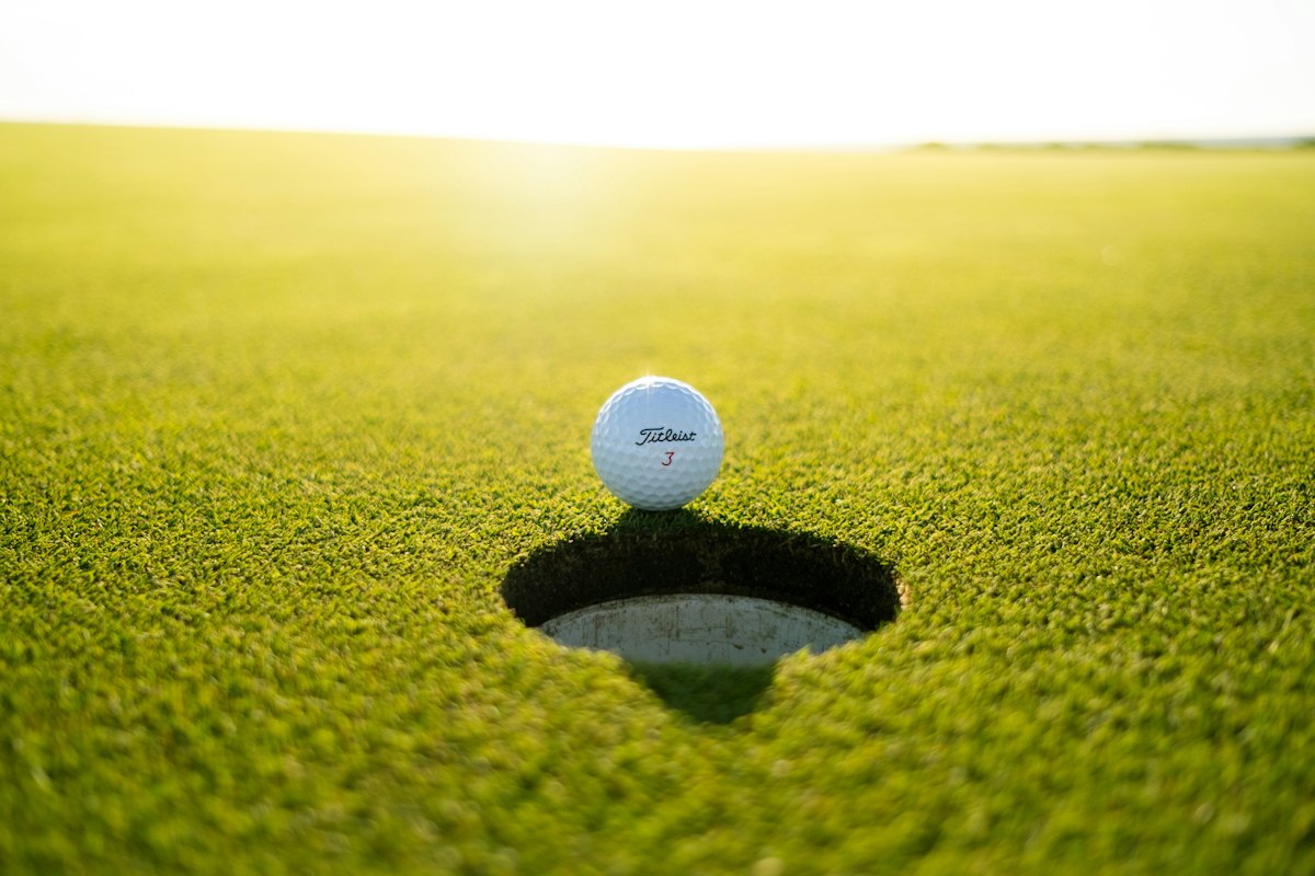 Sunrise over links golf course fairway